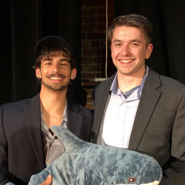 Alec & Kobe posing with their plushy shark at the Lighthouse Labs Demo Day! Photo by Dina Weinstein / Richmond Inno