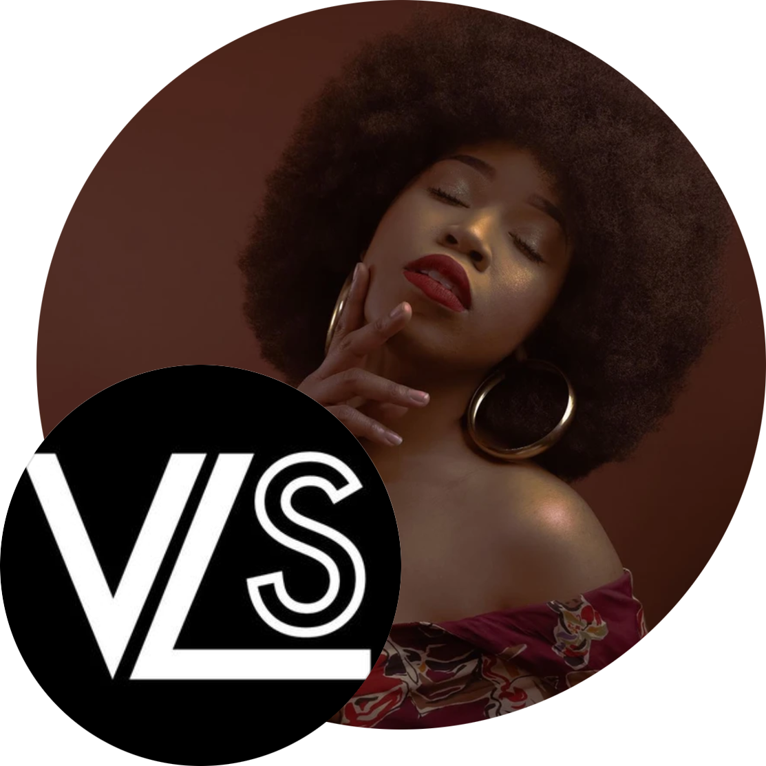 Logo & promotional image for Visionary Live Studio, showing a very artistic, fashion-style portrait of founder, Akilah McCrorey. Her eyes are closed & her head is tiled up toward the right, capturing the light on her face, which is framed beautifully by her large spherical afro. She's wearing an off-the-shoulder dress, with large gold hoop earrings, and has deep red lipstick on. All together she is looking fabulous!